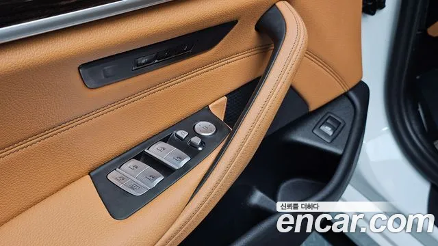 BMW 5-Series — фото 14