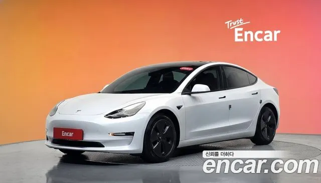 Tesla Model 3 — фото 21