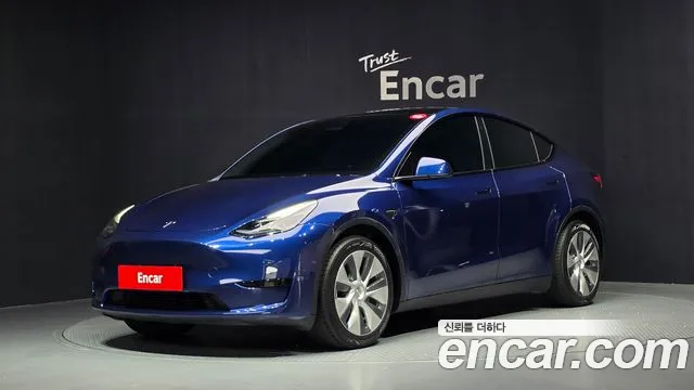 Tesla Model Y — фото 1