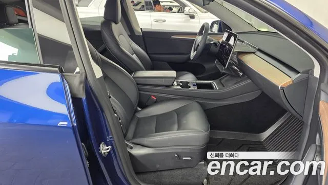 Tesla Model Y — фото 11