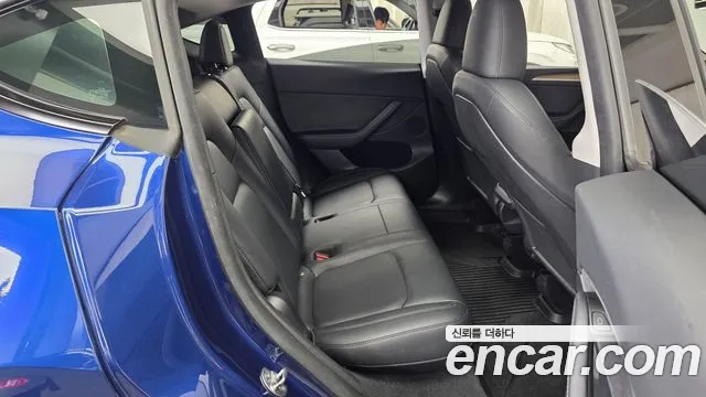 Tesla Model Y — фото 12