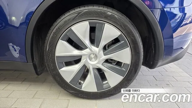 Tesla Model Y — фото 21