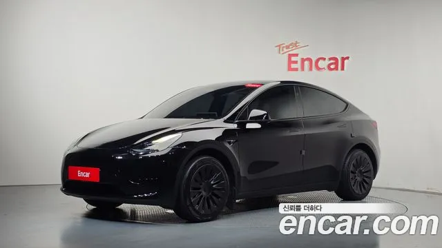 Tesla Model Y — фото 1
