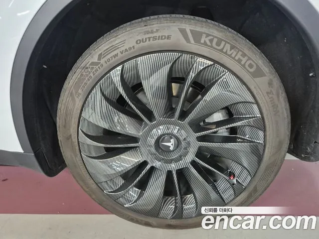 Tesla Model Y — фото 19