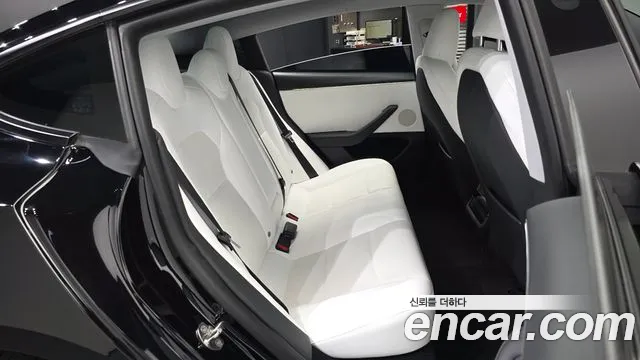 Tesla Model 3 — фото 11