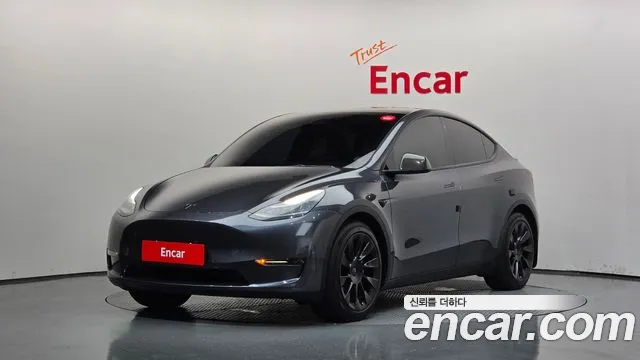 Tesla Model Y — фото 1