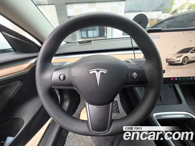 Tesla Model 3 — фото 12