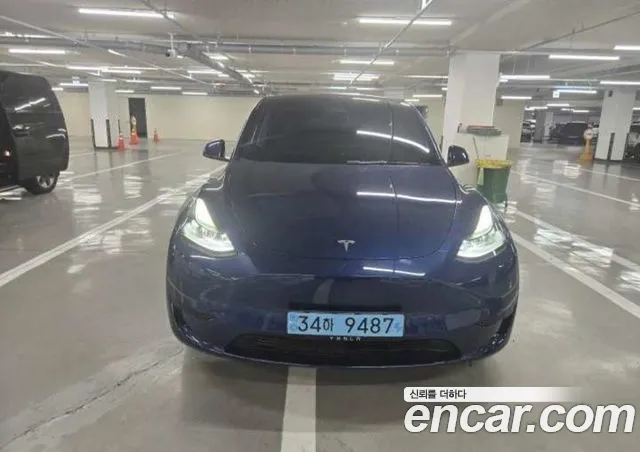 Tesla Model Y — фото 1