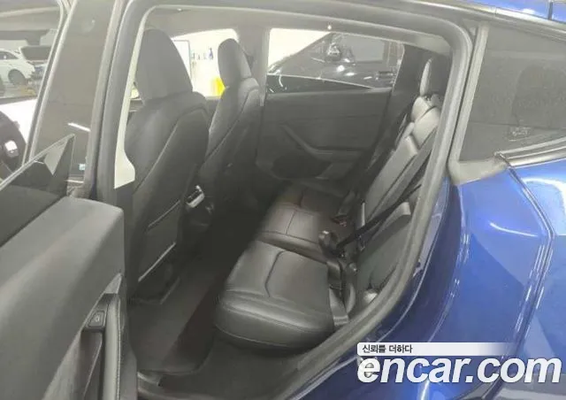 Tesla Model Y — фото 11