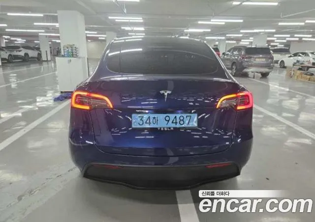 Tesla Model Y — фото 3