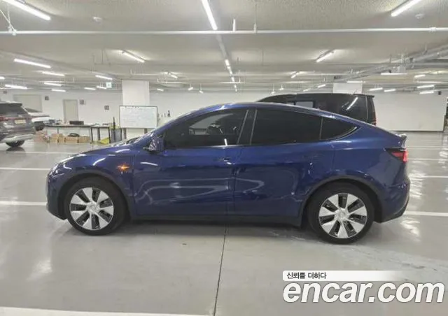 Tesla Model Y — фото 5