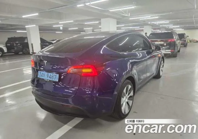 Tesla Model Y — фото 6