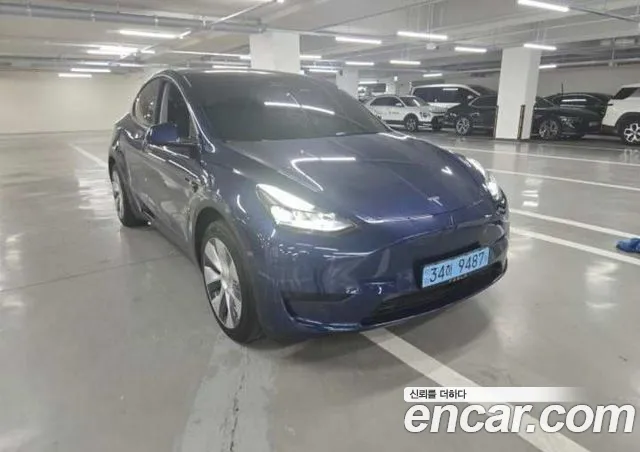 Tesla Model Y — фото 8