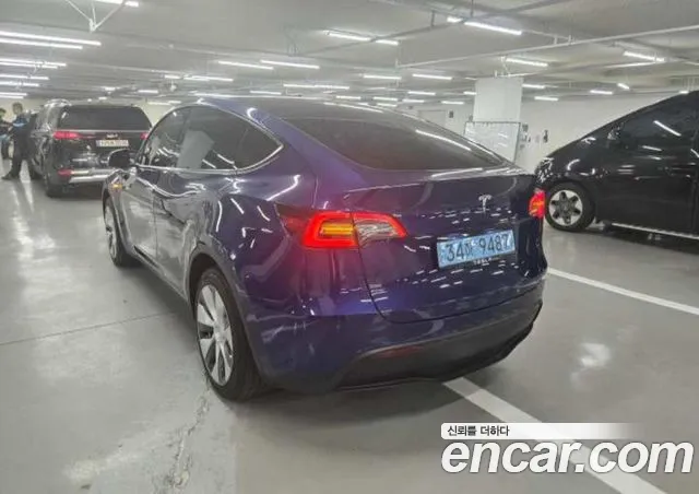 Tesla Model Y — фото 10