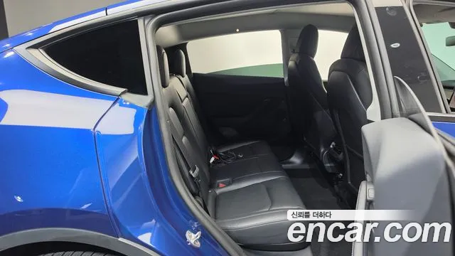 Tesla Model Y — фото 11