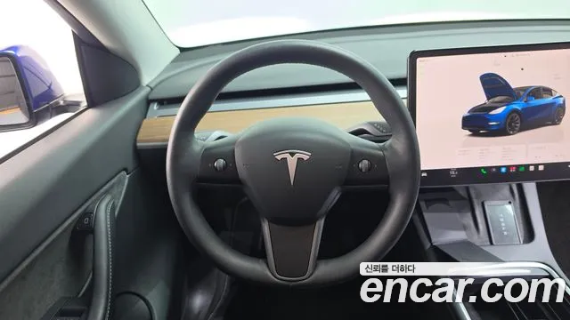 Tesla Model Y — фото 14
