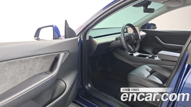Tesla Model Y — фото 10