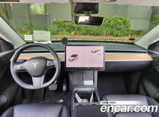 Tesla Model Y — фото 14