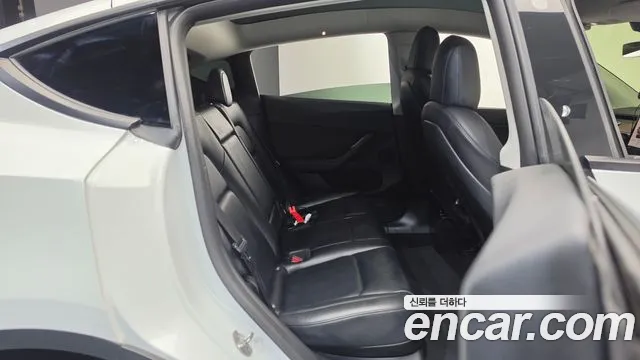 Tesla Model Y — фото 11