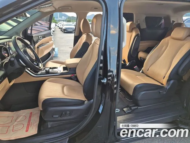 Kia Carnival — фото 11