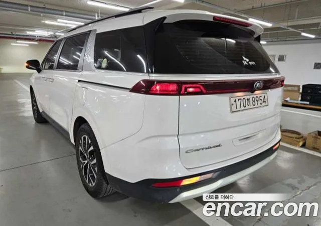 Kia Carnival — фото 10