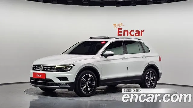 Volkswagen Tiguan — фото 1
