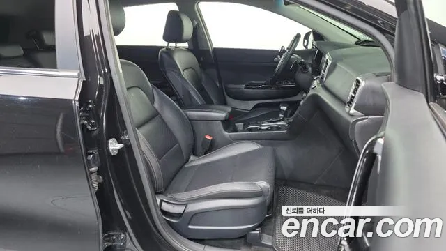 Kia Sportage — фото 11