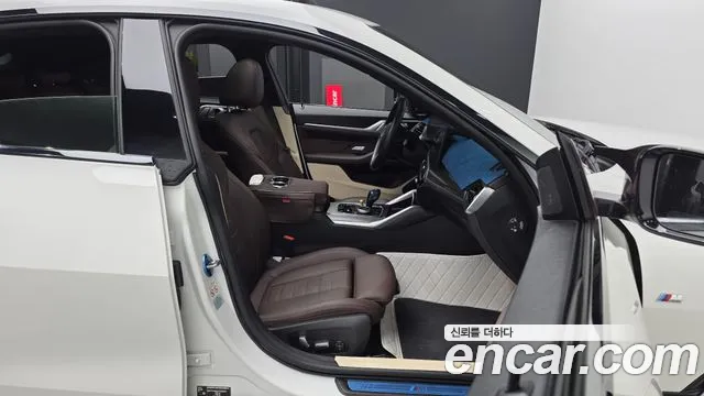 BMW i4 — фото 11
