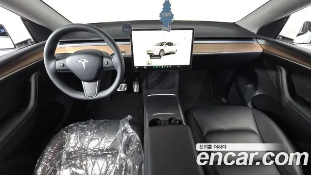 Tesla Model Y — фото 6