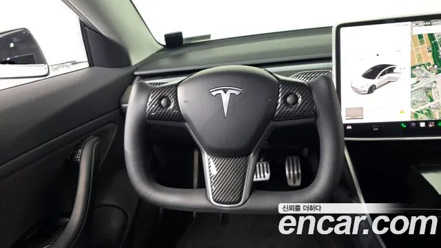 Tesla Model 3 — фото 11