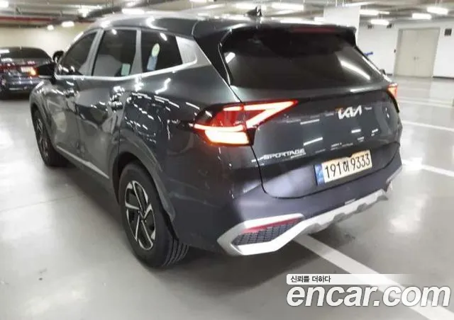 Kia Sportage — фото 11