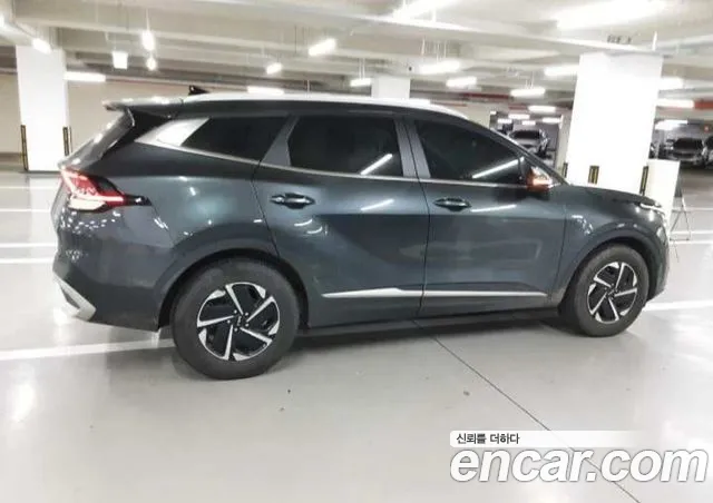 Kia Sportage — фото 12