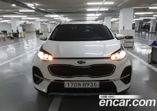Kia Sportage — фото 1