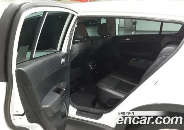 Kia Sportage — фото 11