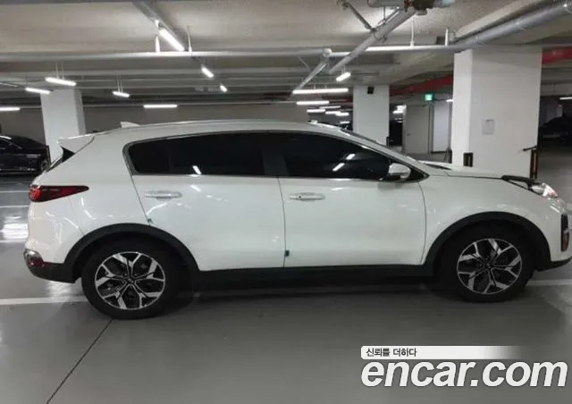 Kia Sportage — фото 12