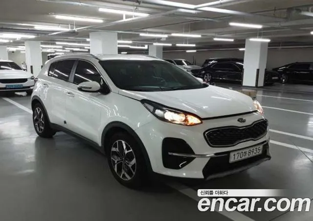 Kia Sportage — фото 8