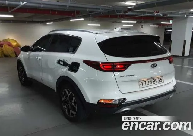Kia Sportage — фото 10