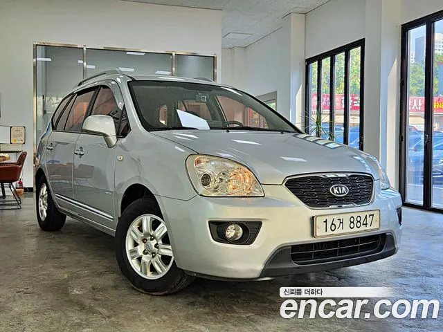 Kia Carens — фото 1