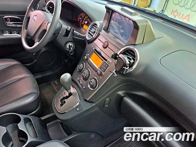 Kia Carens — фото 11