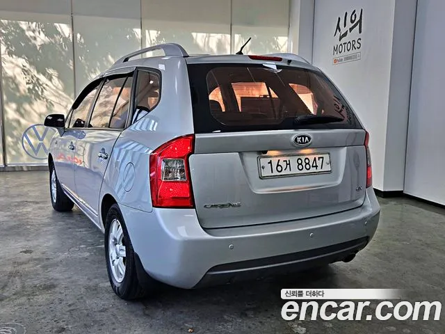 Kia Carens — фото 2