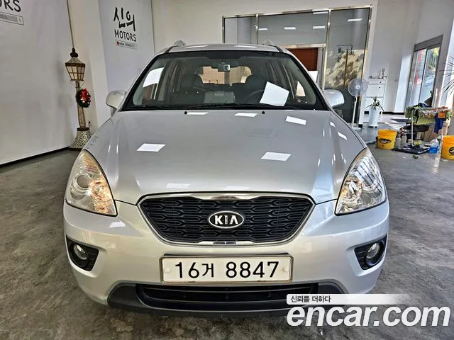 Kia Carens — фото 4