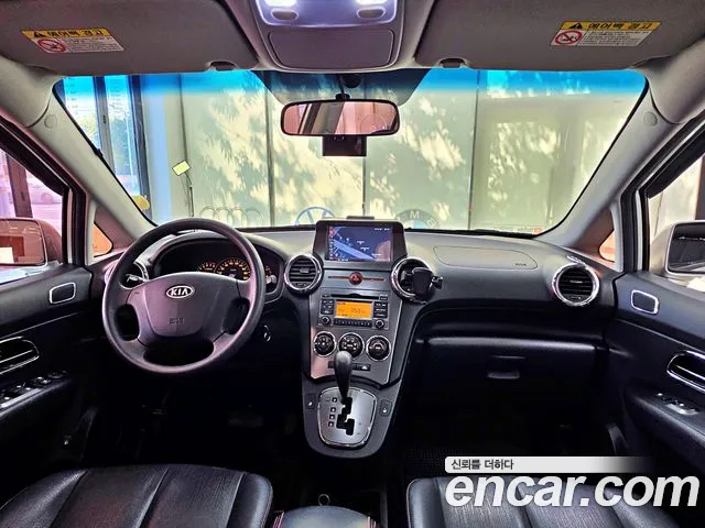 Kia Carens — фото 6