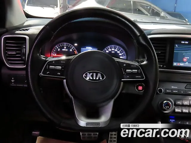 Kia Sportage — фото 8