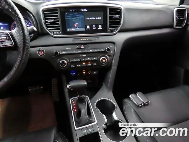 Kia Sportage — фото 9