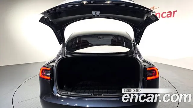 Tesla Model 3 — фото 18