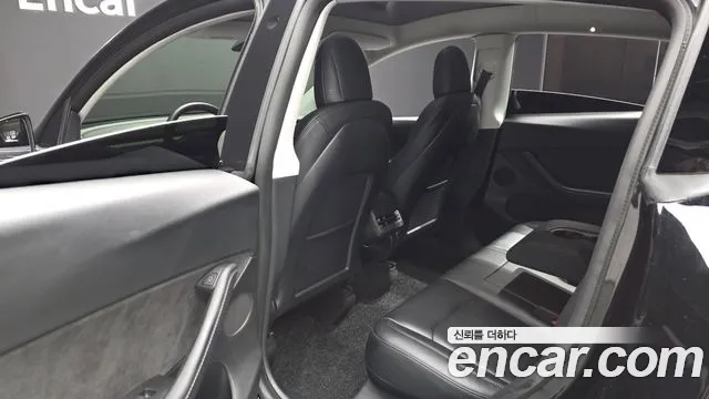 Tesla Model Y — фото 11