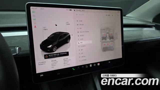 Tesla Model Y — фото 15