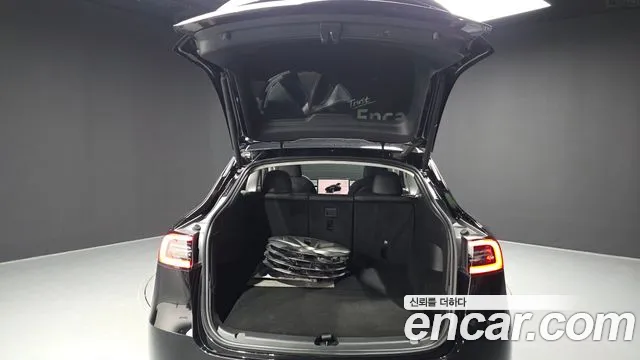 Tesla Model Y — фото 34