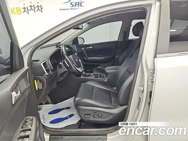 Kia Sportage — фото 11