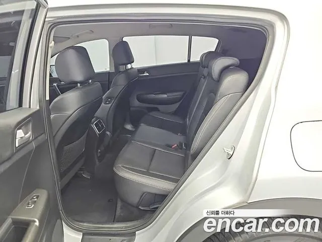 Kia Sportage — фото 12